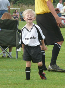 Nathan loves playing soccer.